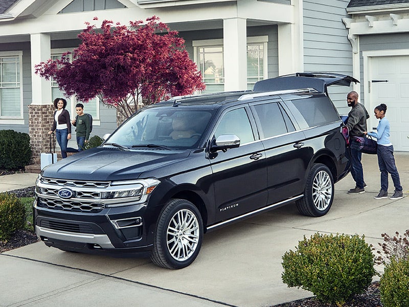 Family Getting into a New Ford Expedition