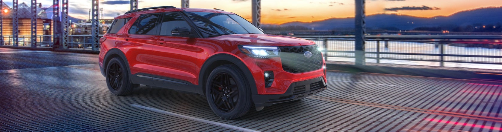 New Ford Explorer on a Bridge at Sunset